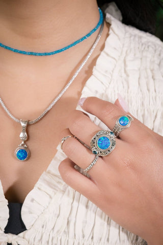 Unyielding Resolve Ring™ in Bali Blue Simulated Opal - Dinner - only found at SARDA™